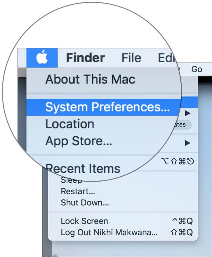 Kliknij logo Apple, a następnie kliknij Preferencje systemowe na Macu