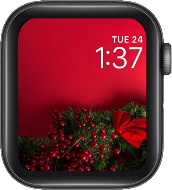 Cara de rellotge de fons vermell de Nadal